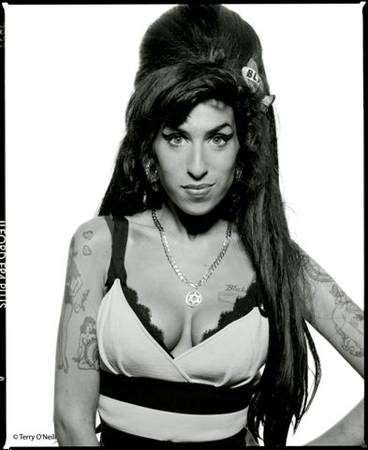Amy Winehouse backstage. Photograph by Terry O
