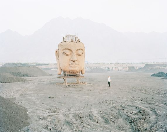Buddha in Coal Yard, Ningxia Province © Kechun Zhang. Recipient of the Prix découverte