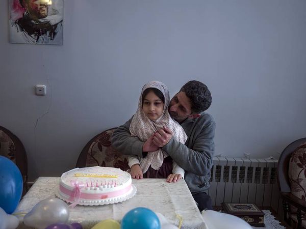 © Newsha Tavakolian. Ali and his daughter Hadis
